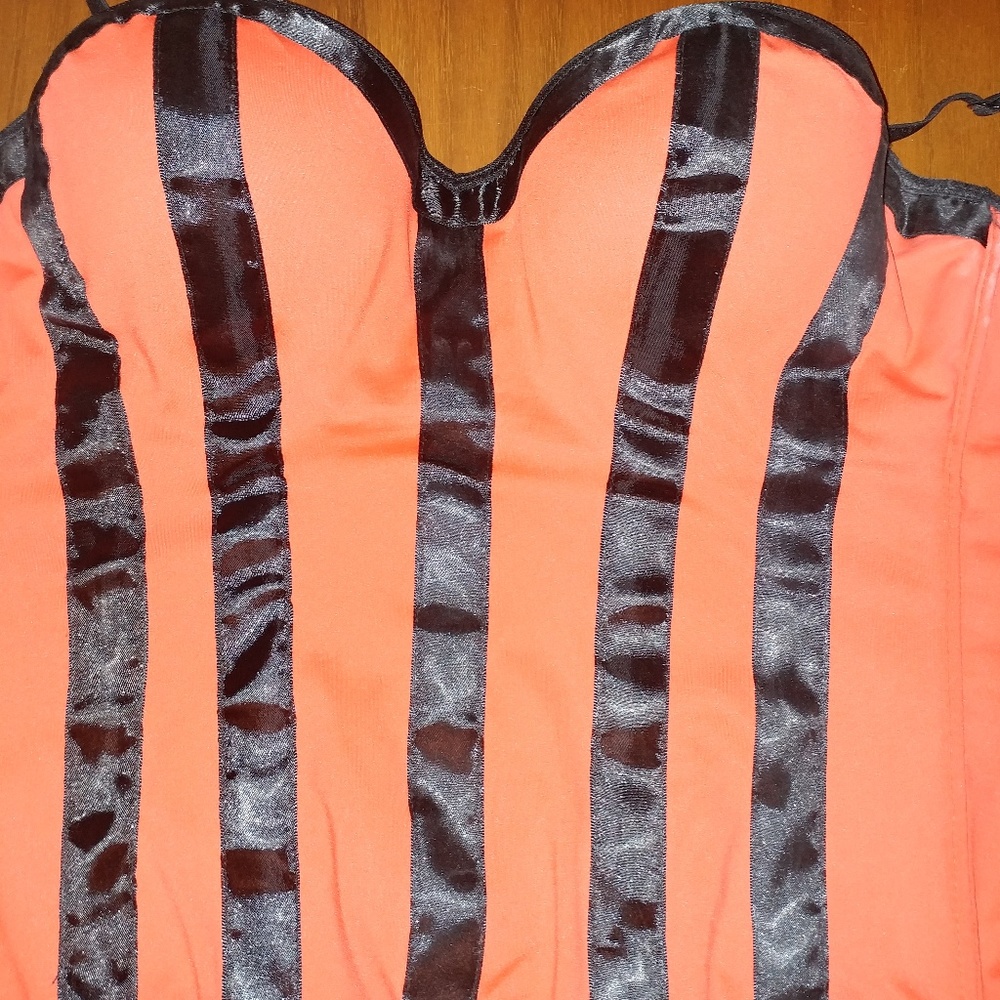 Red corset with black trim